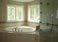 Interiors... Master bathroom tub with steam shower